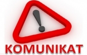 Czerwony trojkat z wykrzyknikiem. Napis komunikat