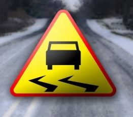 oblodzona droga znak informujacy